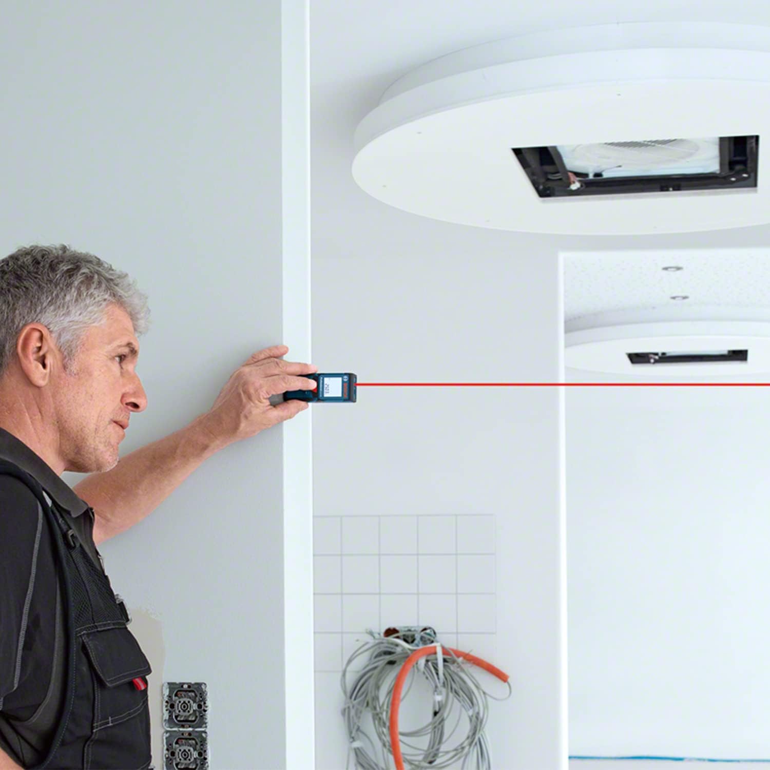 Bosch Professional Laser Entfernungsmesser GLM 40 (Flächen-/Volumenberechnung, max. Messbereich: 40 m, 2X 1,5-V Batterien, Schutztasche)